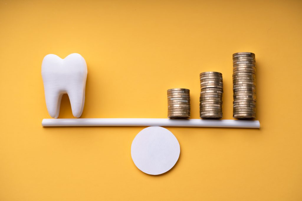 weighing dental implant costs